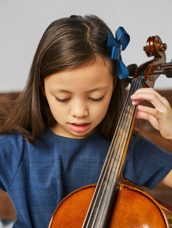 Young student with cello